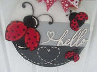 Thumbnail for Cute ladybug door hanger with layered wood design, perfect for welcoming guests.