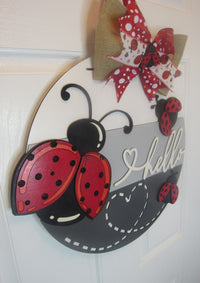 Thumbnail for Ladybug welcome sign, 18 inches round wooden hanger for outdoor decor.