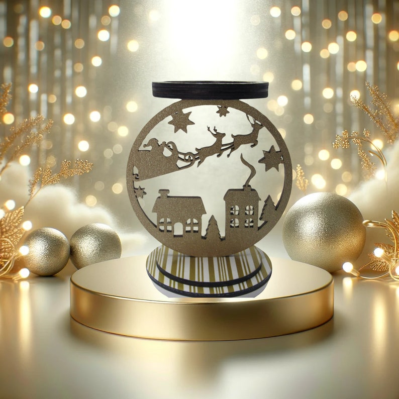 Santa sleigh and reindeer candle holder with sparkling gold glitter finish, perfect as a holiday gift or decor item.