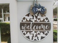Thumbnail for Wooden welcome sign with butterfly motif and black and white bow