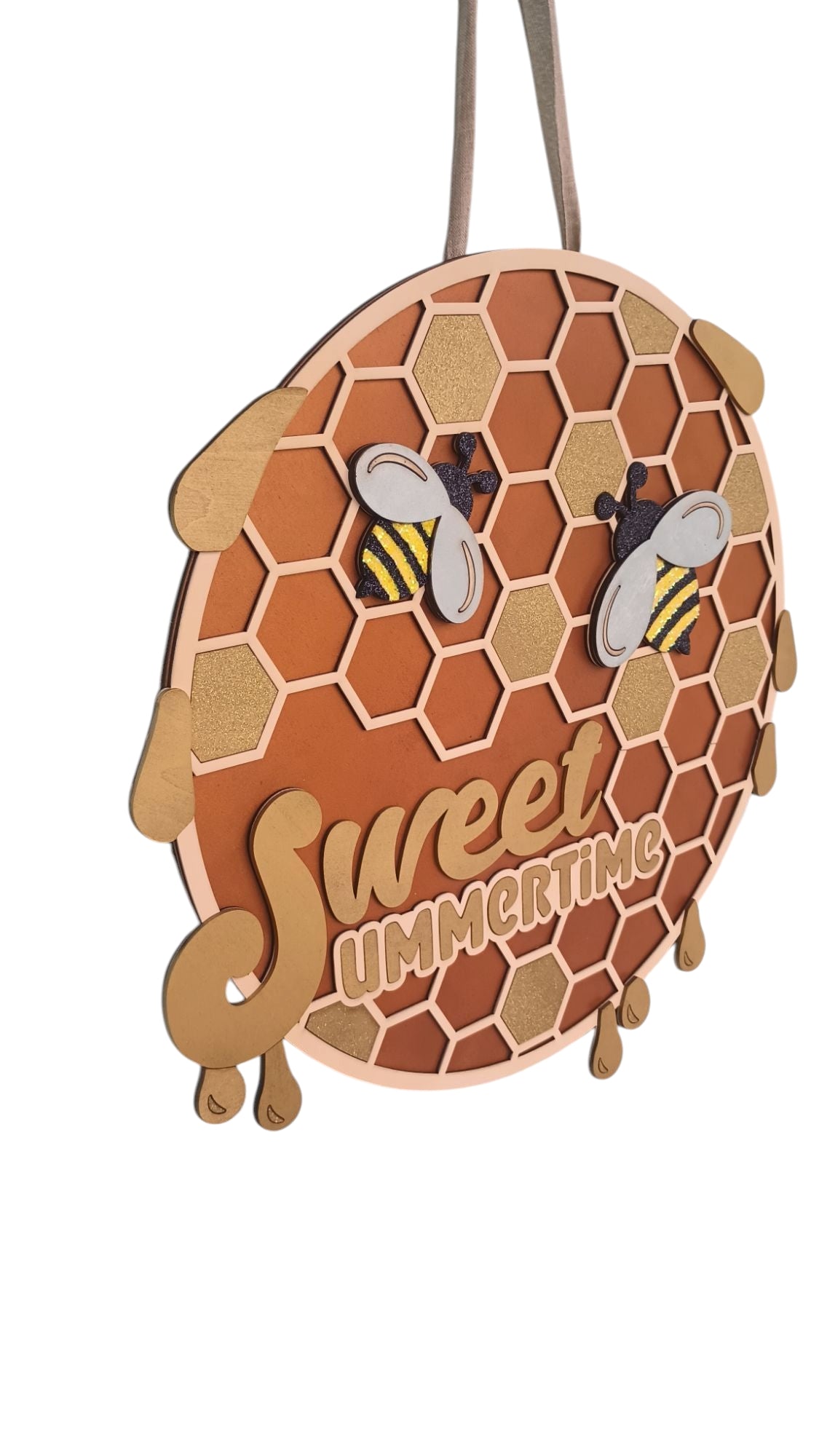 Bee welcome sign with honeycomb pattern and glitter details