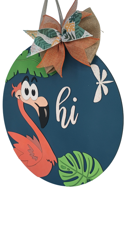 Decorative sign with a flamingo, leaves, and the word 'hi' on a blue background.