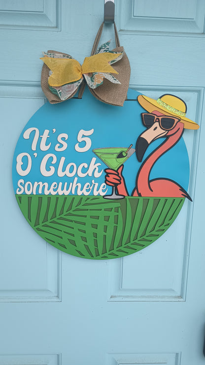 Flamingo welcome sign with burlap bow and tropical colors
