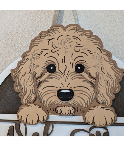 Close-up detail of Goldendoodle dog illustration on handmade wooden door sign
