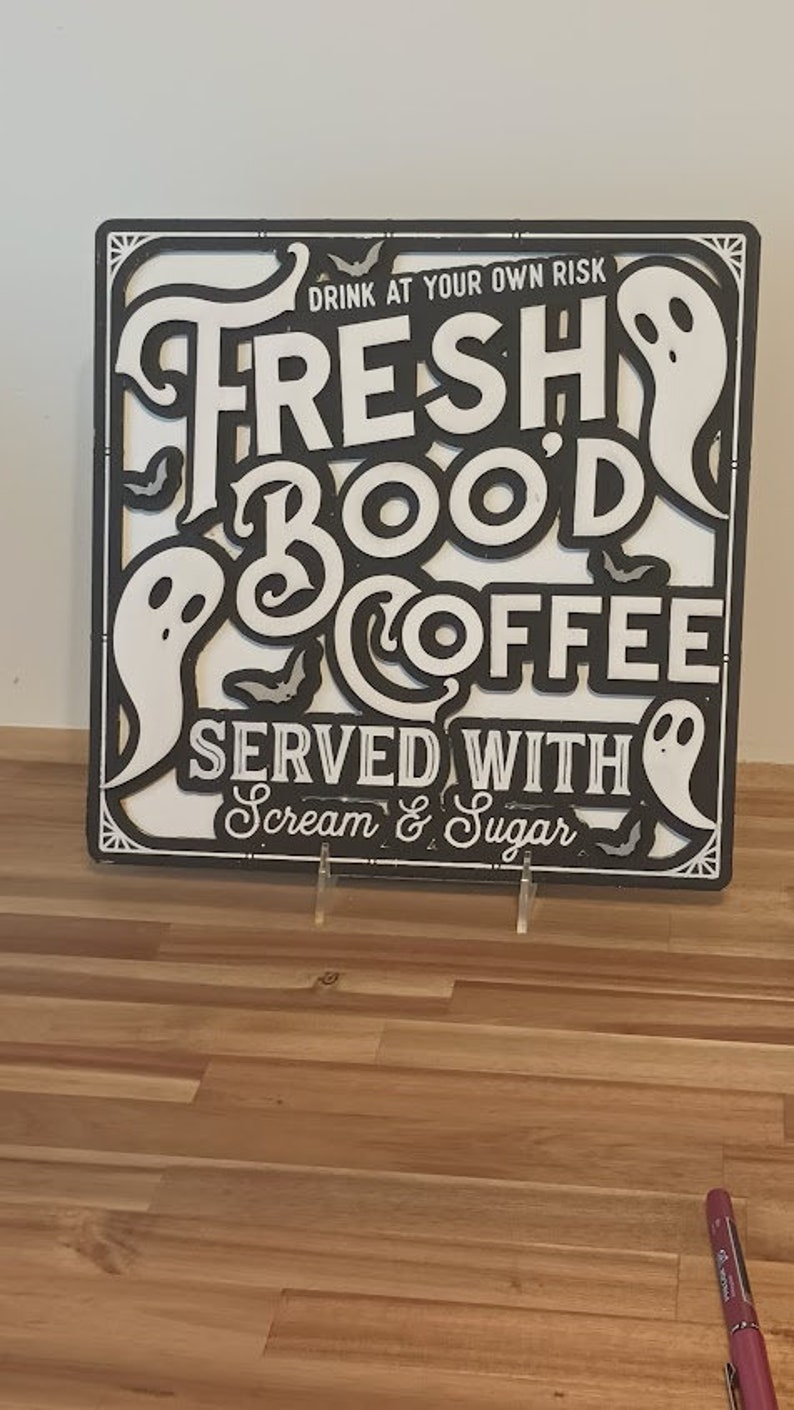 Wooden "Fresh Boo'd Coffee" sign with Halloween accents for coffee lovers.