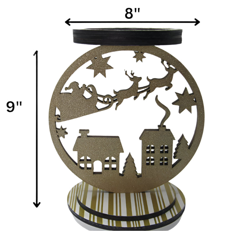 Handmade Christmas candle holder with gold glitter finish, Santa village design, and unique striped paper base for festive home decor.