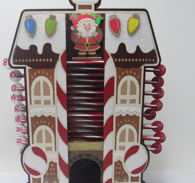 Christmas countdown calendar featuring a gingerbread house illustration for holiday decor