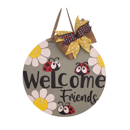 ladybug welcome friends door hanger sign