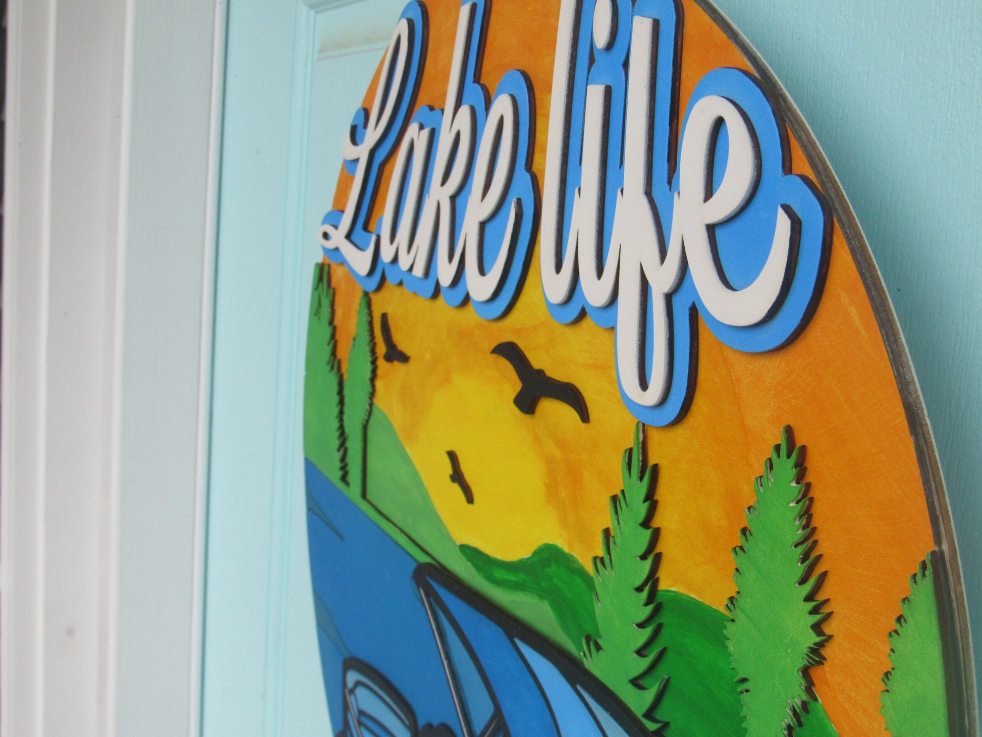 Lakeside home sign with a charming design, suitable for lake house or cabin entryways.