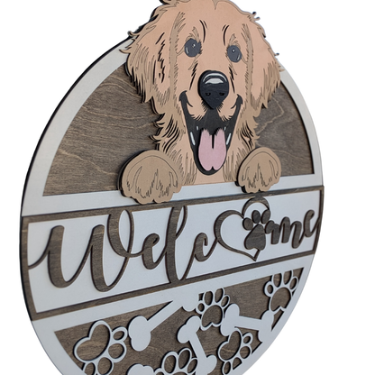 Decorative sign with a golden retriever dog and Welcome text with paw print on a white background