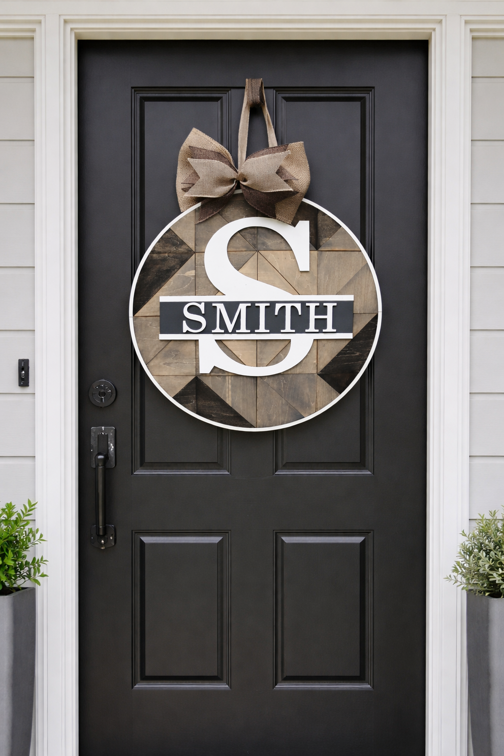 Personalized entryway decor sign with large letter monogram and family name
