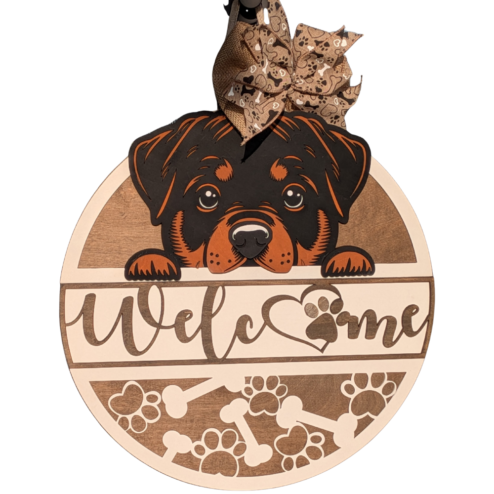 Round wooden Rottweiler welcome sign on a white background
