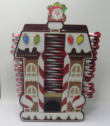 Festive Christmas advent calendar designed to resemble Santa's house with candy cane decorations