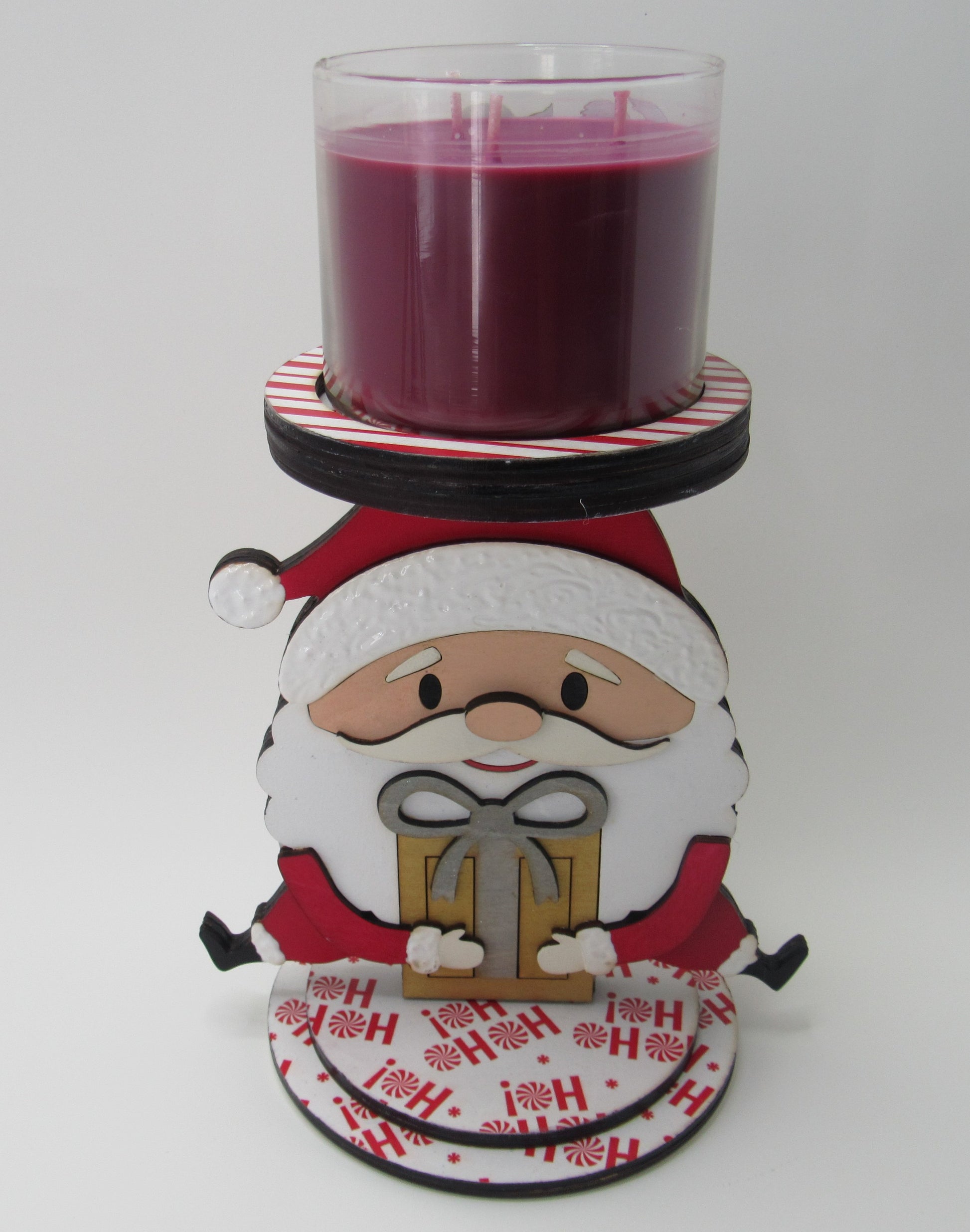 Wooden Santa Candle Holder styled as a centerpiece for Christmas table or mantel displays.