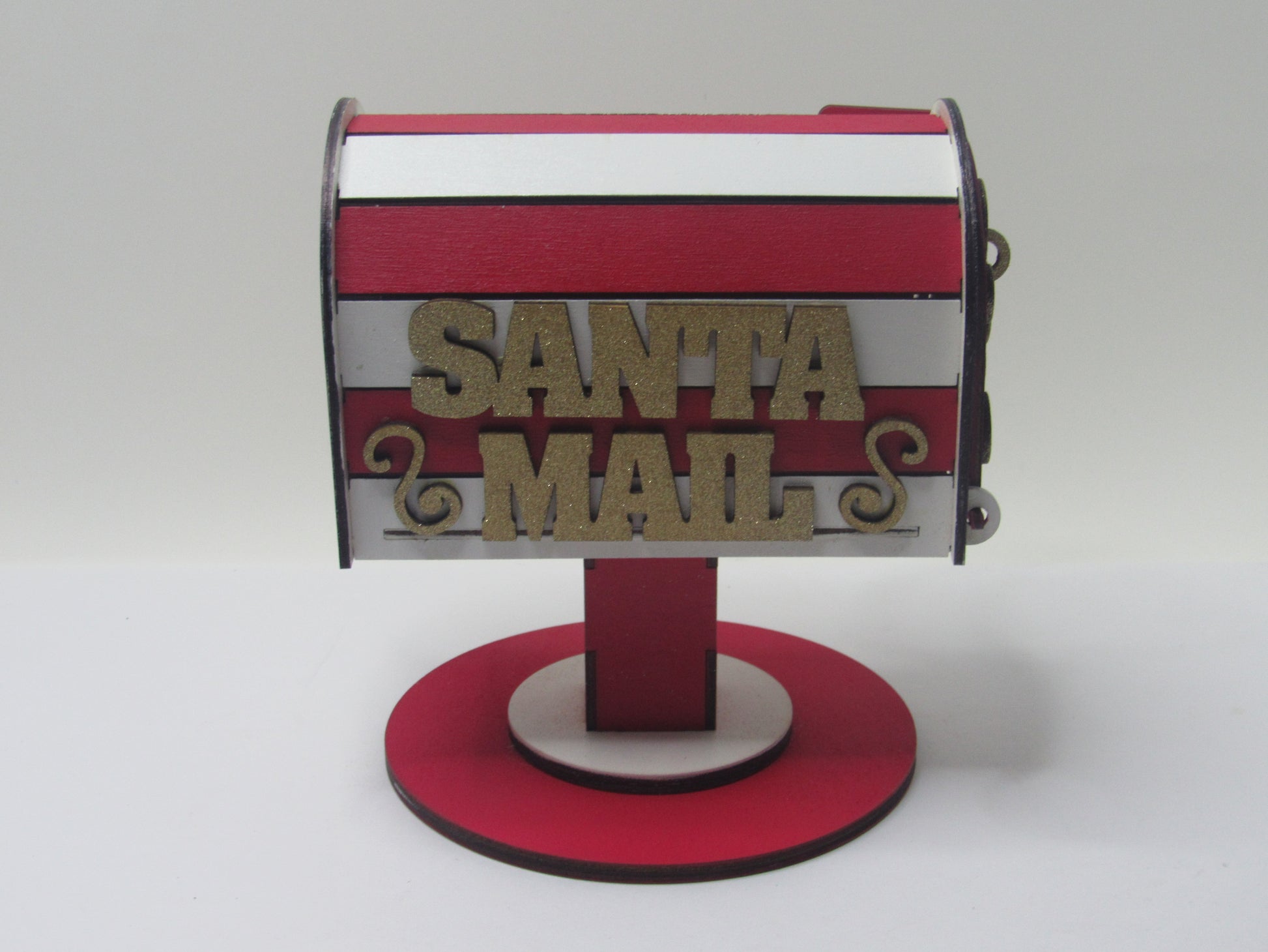 Red and white wooden Santa mailbox for letters, compact 8.5x7-inch size, hand-assembled with gold accents, perfect for holiday decorations.