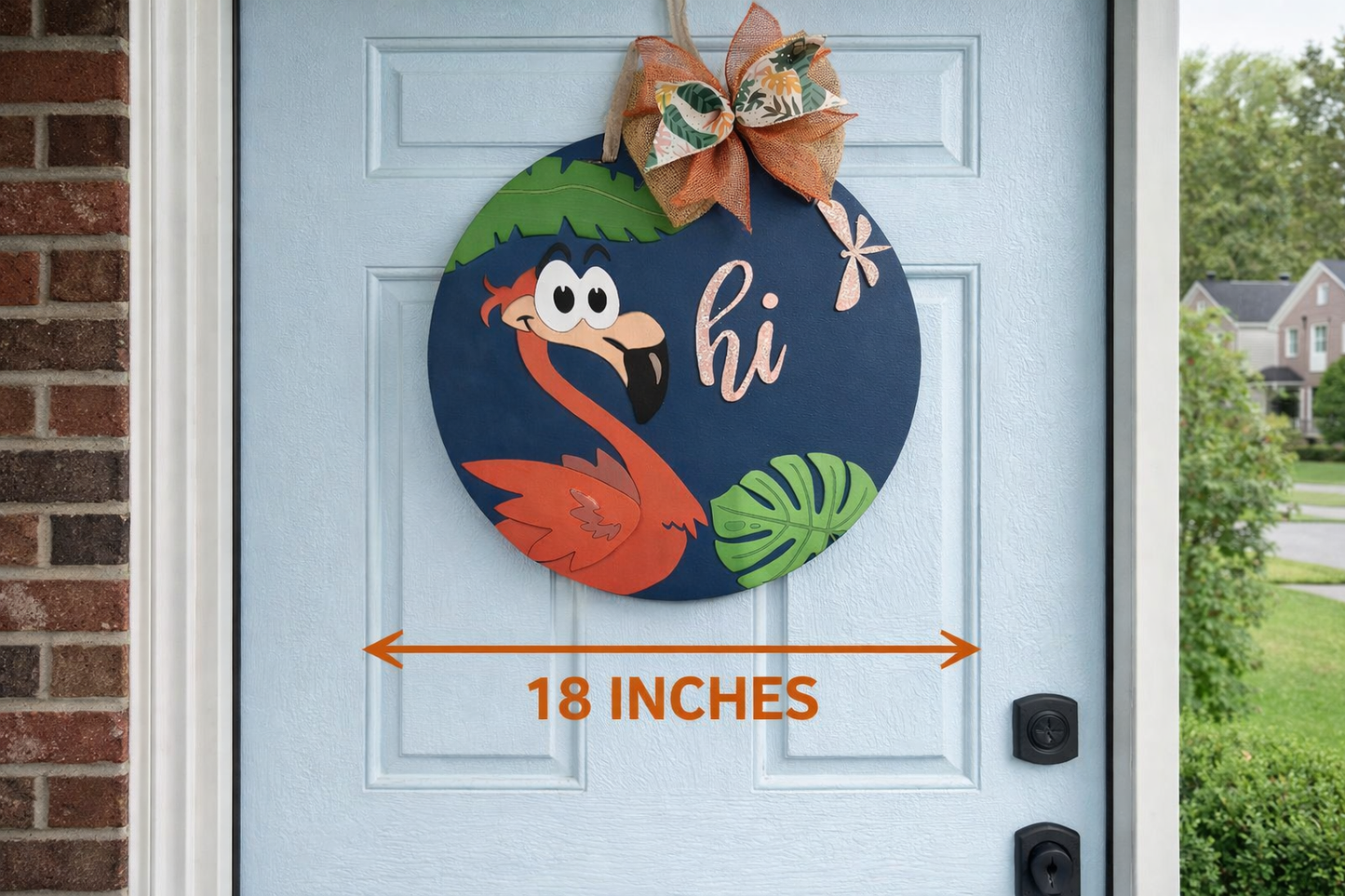 Decorative flamingo door hanger with 'hi' text on a blue door, showing measurement of 18 inches.