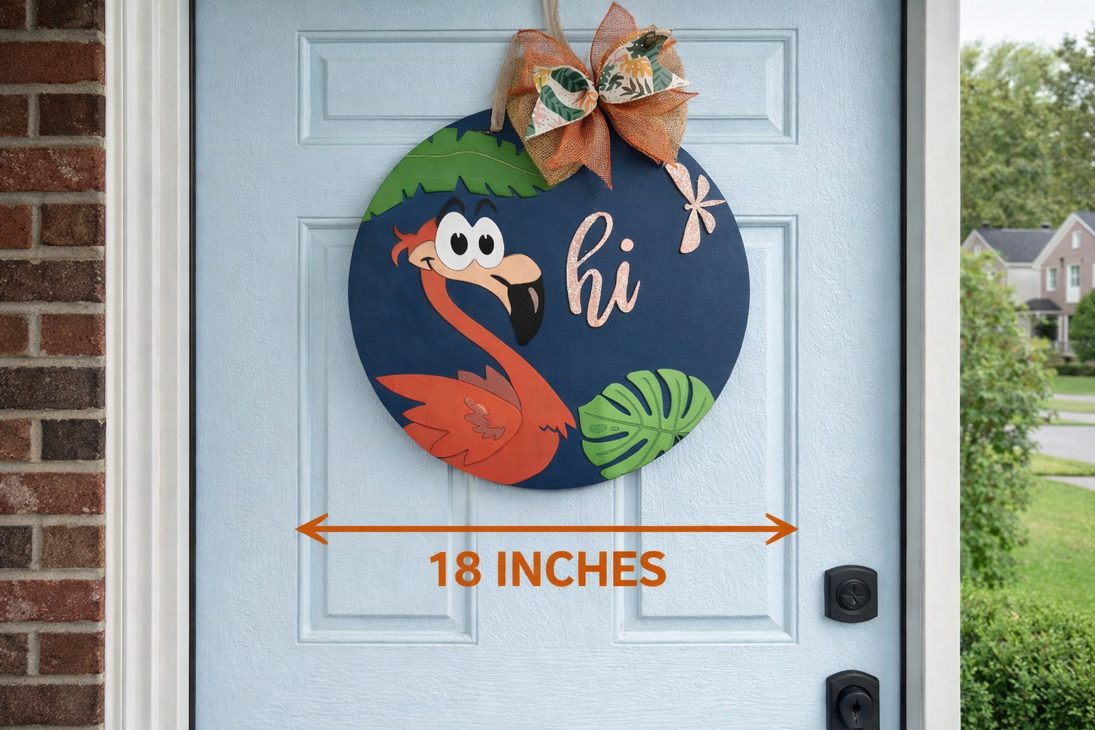 Decorative flamingo door hanger with 'hi' text on a blue door, showing measurement of 18 inches.