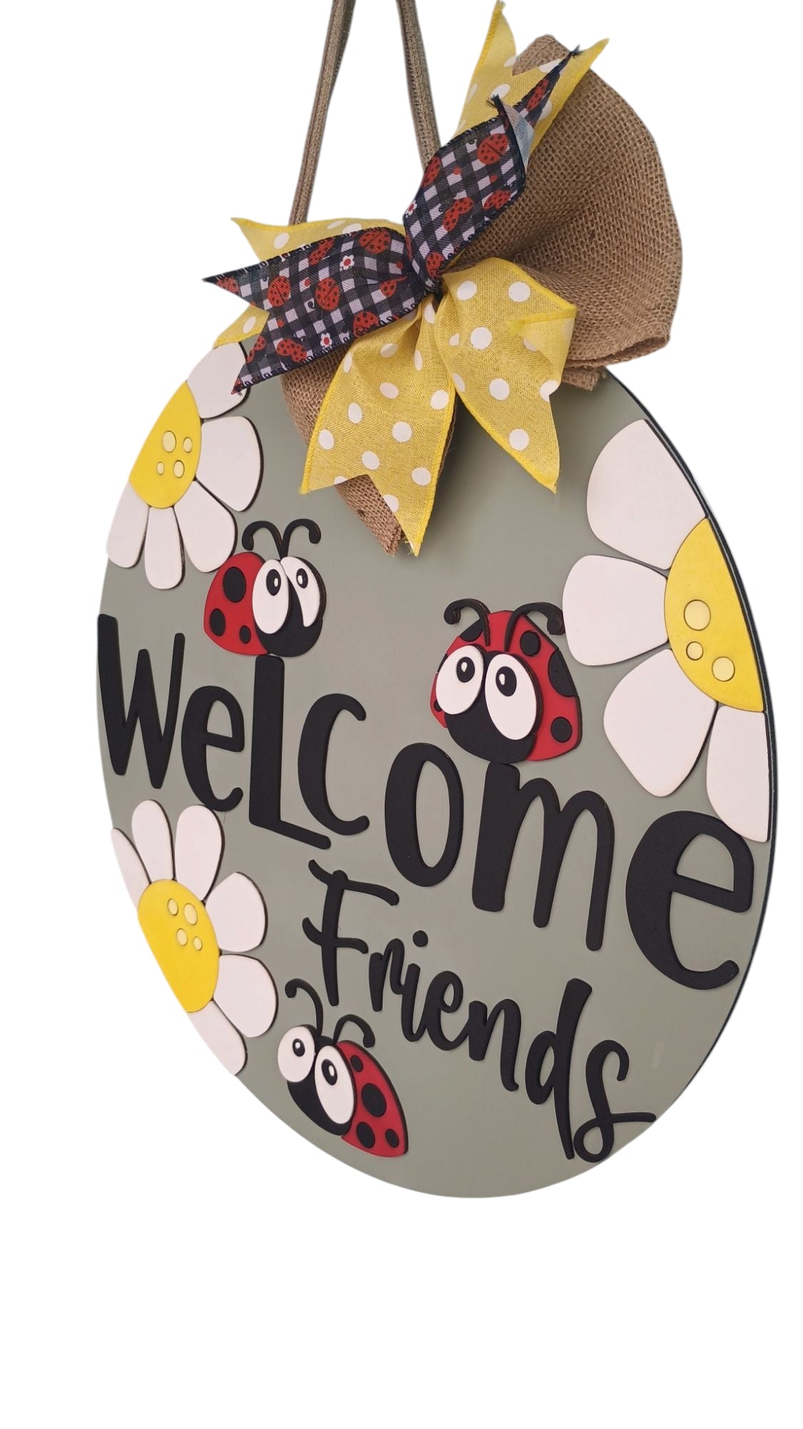 Spring door hanger with glitter bow and ladybug accents