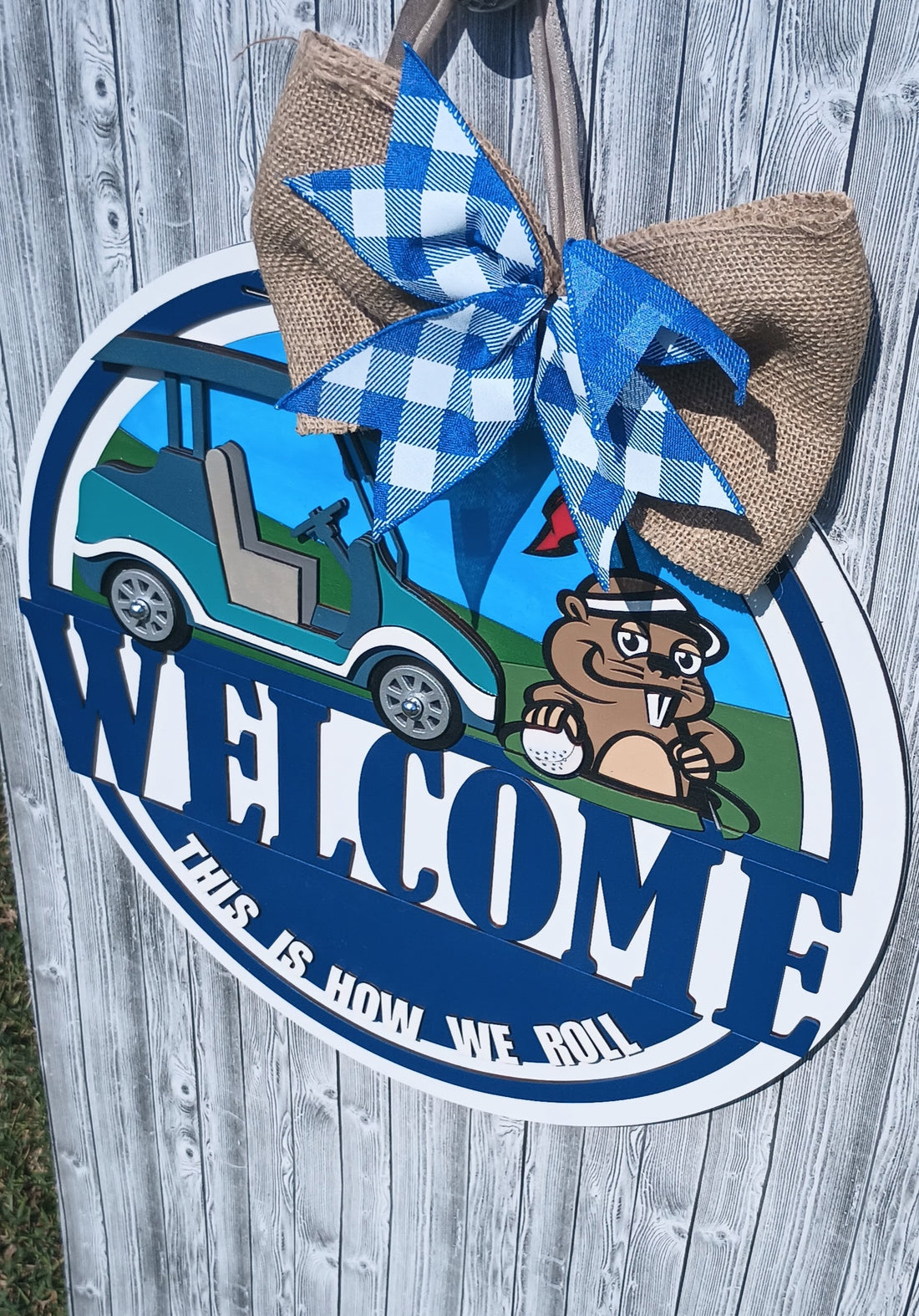 Unique golf door hanger with gopher, golf ball, and cart, ideal for clubhouse or golf shed.